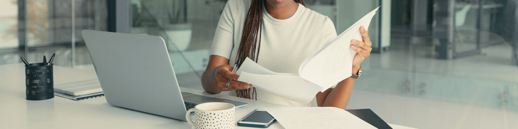 Lady viewing spreadsheet, financials, Bankruptcy & Debt Relief